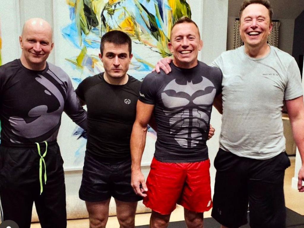 Unleash The Walrus … Elon Musk at a training session with Georges St Pierre (red shorts, next to Musk) and others.