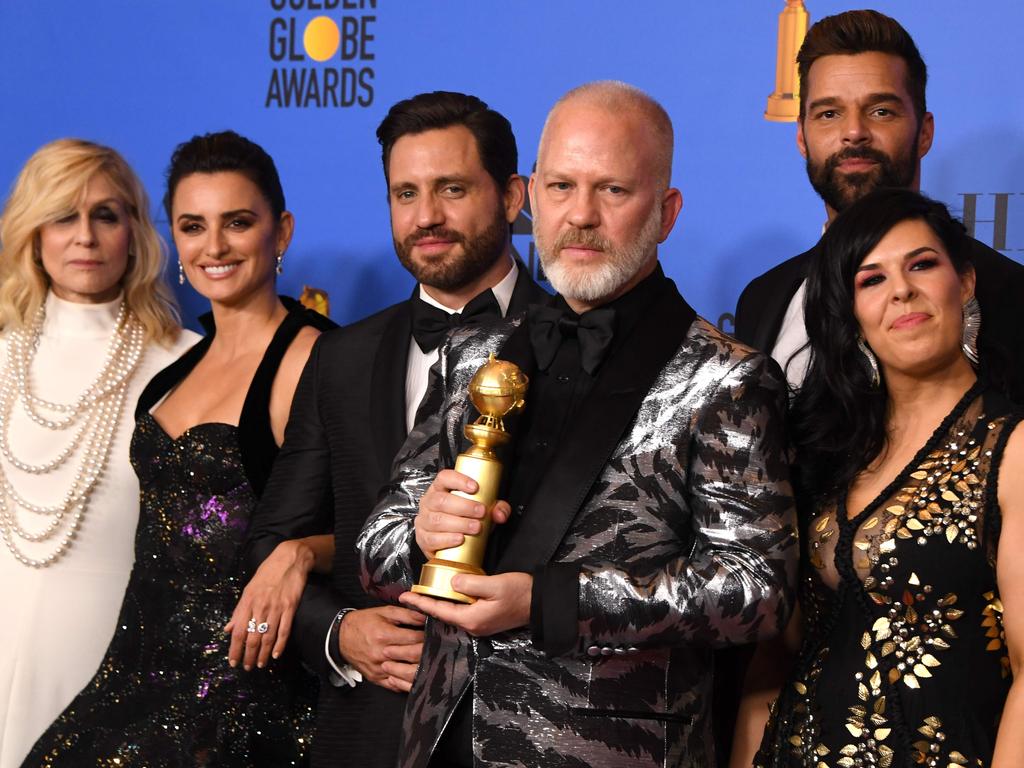 Producer Ryan Murphy, front, with the cast of The Assassination of Gianni Versace: American Crime Story. Picture: AFP