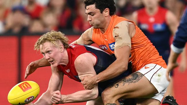 Clayton Oliver still gets his handball away despite some close marking. Picture: Getty Images