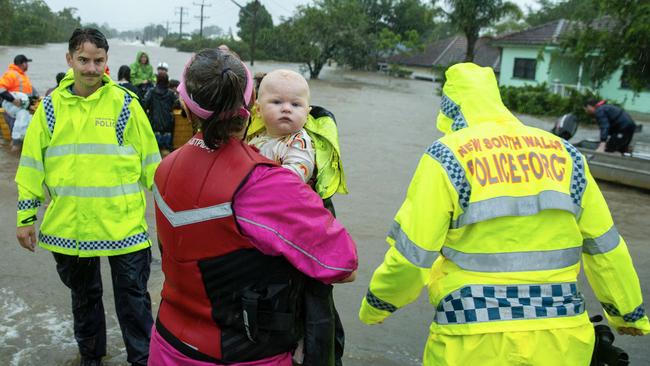 Lismore residents are rescued from rising flood waters. Picture: Media Mode