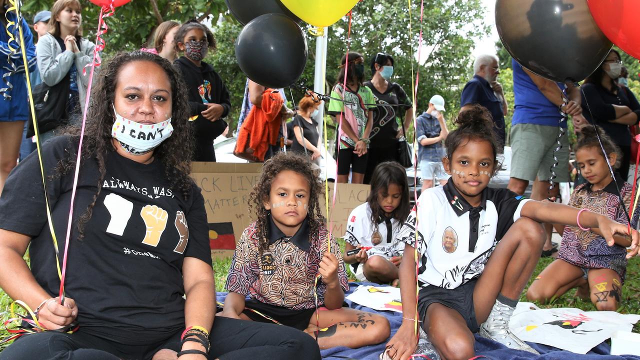 Valerie Thomas, Auril Bellear (6) and Amariah Womal (8) in Fogarty PArk on Sunday to support the Black Lives Matter movement. Picture: PETER CARRUTHERS