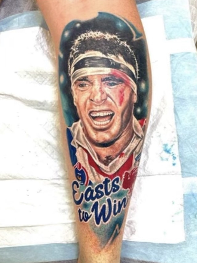 Lowther’s tattoo of Fittler on his calf.