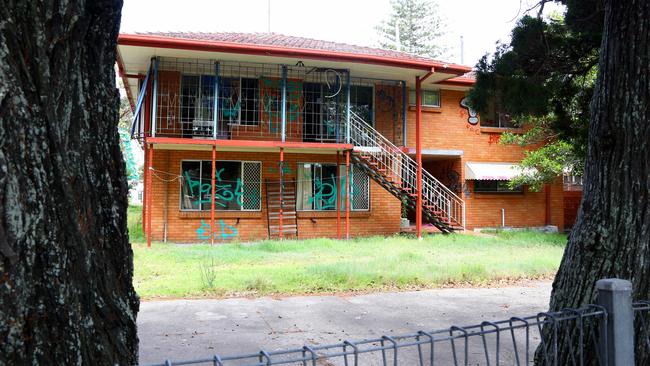 Pictures of two unit blocks next to the Labrador Senior citizen's centre which be derelict for a while, the building have been tag with graffiti and possible swatters living in them  Pic by David Clark