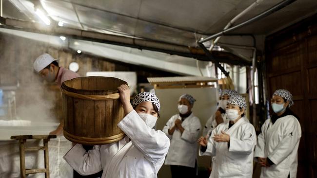 It is all hands on deck at the sake making.