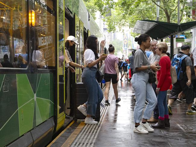 People getting on and off trams in the CBD. Picture: Sarah Matray