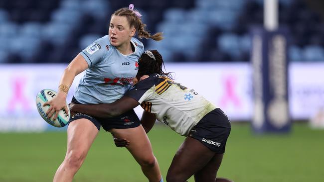 Caitlyn Halse playing for the Waratahs in Super W. Picture: Jason McCawley/Getty Images