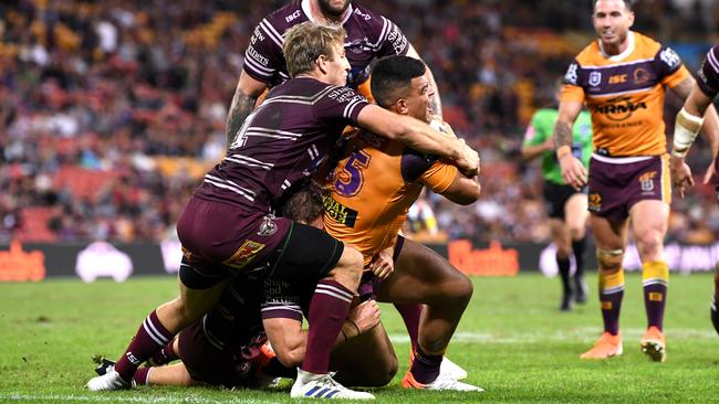 David Fifita attempts to cross for a try. Picture: Bradley Kanaris/Getty Images