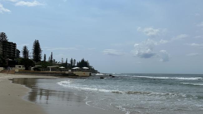 Two mystery surfers risked their own lives to pull a man from the water onto rocks at Kings Beach on February 13. Picture: Letea Cavander