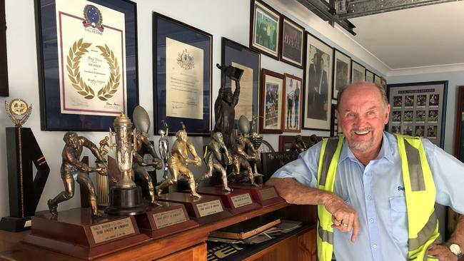 Ray Price at home on the Gold Coast with his trophies.