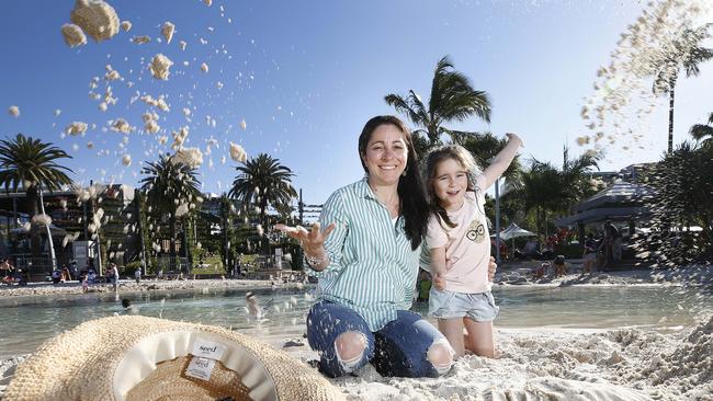 Elouise McCallum and Aysha Wilson, 6, enjoy the weather at South Bank in Brisbane. Picture: AAP/Josh Woning