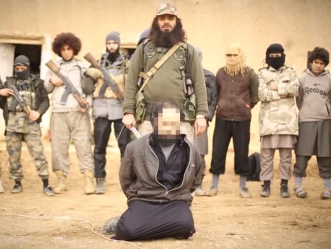 Harvest of Apostates video posted on February 7. showing what is believed to be Khaled Sharrouf executing a prisoner and Mohamed Elomar behind him on the left.