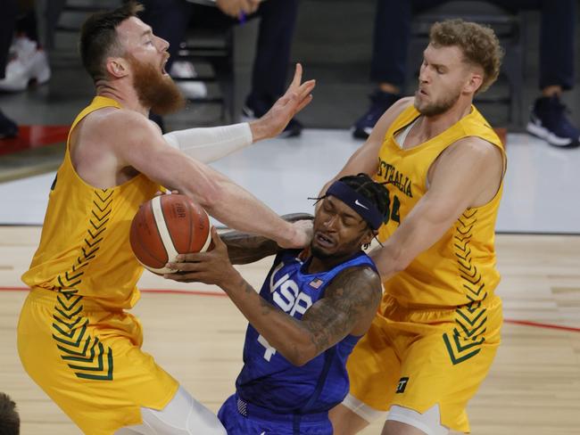 Bradley Beal #4 of the United States drives into Aron Baynes #12 as Jock Landale #34 defends. Picture: Ethan Miller/Getty Images