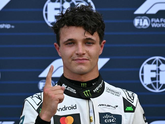 McLaren's British driver Lando Norris celebrates after taking Pole Position at the end of qualifying for the Formula One Monaco Grand Prix at the Circuit de Monaco, on May 24, 2025. (Photo by Andrej ISAKOVIC / AFP)