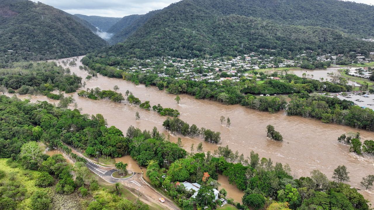 The Barron River in Cairns, Far North Queensland, reached a record flood peak, with roads closed and homes flooded in the catchment area on Sunday, December 17. Picture: Brendan Radke