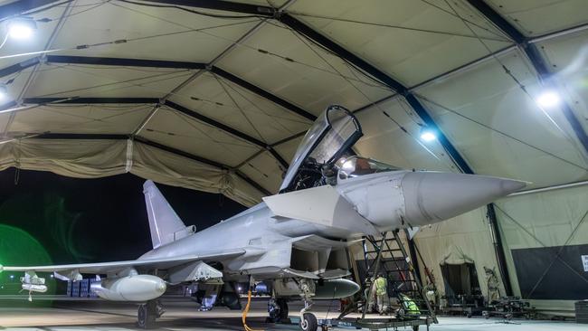 An RAF Typhoon aircraft returns to berth following a strike mission on Yemen's Houthi rebels at RAF Akrotiri. Picture: Getty Images