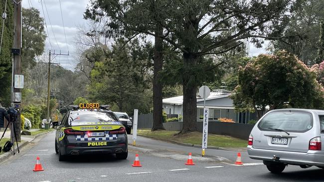 Police at the scene of an explosion in Upwey, that left a man fighting for life and another badly injured. Picture: Kiel Egging