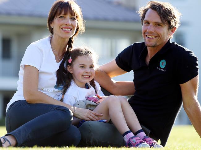 Ryan and Karen Fowler with their daughter Remi. Ryan will run from Melbourne to Sydney next month to raise money for "Rio's Legacy" in honour of his late son. Picture: Sam Ruttyn