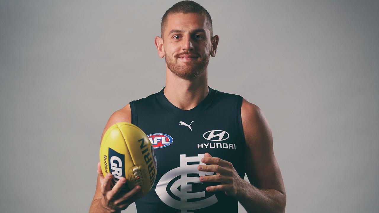 MELBOURNE, AUSTRALIA - FEBRUARY 26: Liam Jones of the Blues poses for a photograph during the Carlton Blues 2021 Official Team Photo Day at Ikon Park on February 26, 2021 in Melbourne, Australia. (Photo by Michael Willson/AFL Photos)