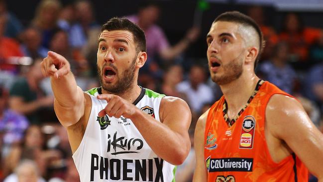 Phoenix's Adam Gibson shouts instructions at his teammates in the National Basketball League (NBL) New Year's Eve match between the Cairns Taipans and the South East Melbourne Phoenix, held at the Cairns Convention Centre. PICTURE: BRENDAN RADKE