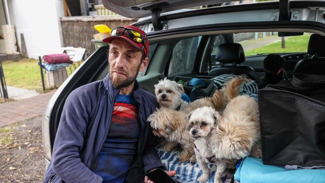 Hayden Patterson who is being forced out of home and moving into his car with his dogs. Image/Russell Millard Photography