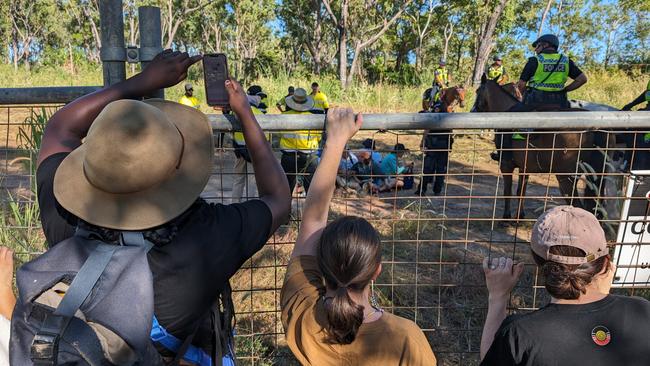 Supporters watch as 40 Binybara Camp members attempted to block further land clearing at Lee Point on Wednesday, May 1. Picture: Zizi Averill