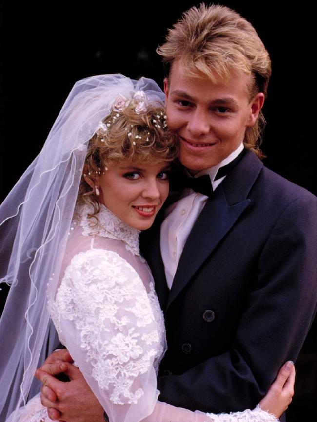 Kylie Minogue and Jason Donovan as Scott and Charlene.