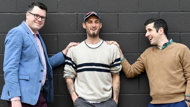 Don Dunstan Foundation executive director David Pearson with Hutt Street Centre regular Shane Gilbert and Jake Maguire from Community Solutions. Picture: Tricia Watkinson.