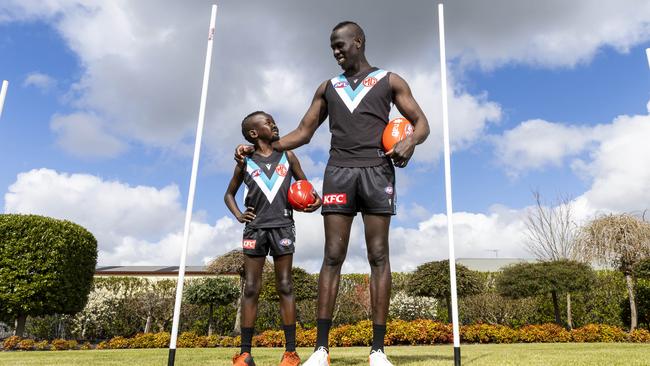 Port Adelaide champion Aliir Aliir with his NAB Mini Legend Timothy Kuol, 8. Picture: Aaron Francis