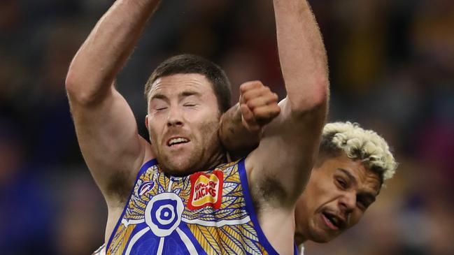 *APAC Sports Pictures of the Week - 2020, August 24* - PERTH, AUSTRALIA - AUGUST 23: Jeremy McGovern of the Eagles marks the ball against Bobby Hill of the Giants during the round 13 AFL match between the West Coast Eagles and the Greater Western Sydney Giants at Optus Stadium on August 23, 2020 in Perth, Australia. (Photo by Paul Kane/Getty Images)