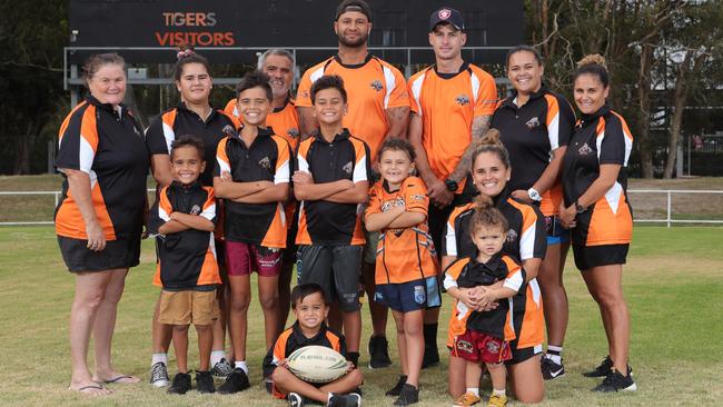 The Shaw family have a massive presence at the Southport Tigers. Back row from left:Jo Shaw, Maddie Shaw, Luke Shaw, Tu Whakatihi, Josh Smart, Jess Shaw, Missy Shaw. Middle row: Kobe Davis, 7, Chayse Davis, 11, Qwayde Whakatihi, 10, Jaci-Lou Smart, 6, Katie Shaw. Front row: Phoenyx Whakatihi, 4, Jazlyn Smart, 2. Picture: Glenn Hampson