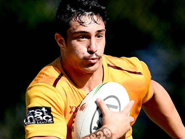 BRISBANE, AUSTRALIA - JUNE 30: Kotoni Staggs runs with the ball during a Brisbane Broncos NRL training session at Clive Berghofer Field on June 30, 2021 in Brisbane, Australia. (Photo by Bradley Kanaris/Getty Images)