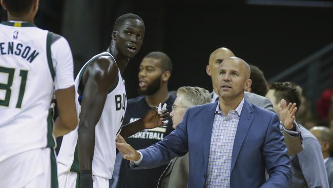 Thon Maker speaks with his head coach, Jason Kidd.