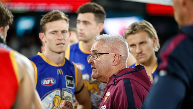 MELBOURNE, AUSTRALIA - MAY 26: Chris Fagan, Senior Coach of the Lions addresses his players at three quarter time during the 2024 AFL Round 11 match between the Hawthorn Hawks and the Brisbane Lions at Marvel Stadium on May 26, 2024 in Melbourne, Australia. (Photo by Dylan Burns/AFL Photos via Getty Images)