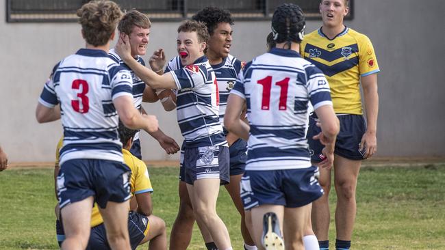 Harry Schwenke celebrates his try for St Mary's. Picture: Nev Madsen.