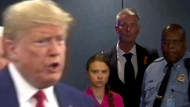 A still from a video of Donald Trump walking past Greta Thunberg at the UN.