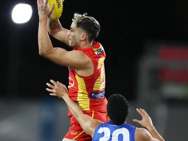 Izak Rankine marks in front of Jason Johannisen. Picture: Michael Klein