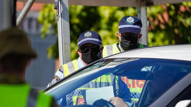 A Nelson Bay man trying to cross back in NSW at Albury checkpoint was charged for breaching a COVID-19 health order. Picture: NCA NewsWire / SIMON DALLINGER