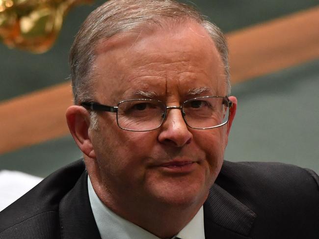 CANBERRA, AUSTRALIA - MARCH 15: Leader of the Opposition Anthony Albanese reacts during Question Time in the House of Representatives at Parliament House on March 15, 2021 in Canberra, Australia. Thousands are expected at Ã¢â¬ÅMarch 4 JusticeÃ¢â¬Â rallies across Australia, calling for action against gendered violence in Parliament, as news of the alleged rape of former Brittany Higgins at Parliament House and allegations that Attorney-General Christian Porter raped a 16-year-old gear when he was 17 in 1988 continue to cause outrage. (Photo by Sam Mooy/Getty Images)