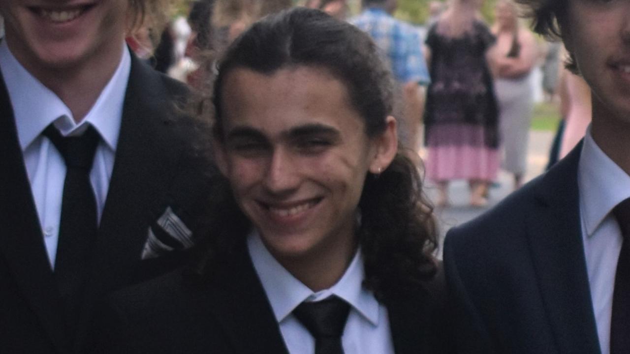 Ethan Buckingham’s love for the cult movie Pulp Fiction was on display with his John Travola inspired mullet at the 2021 Burnside State High School formal. Picture: Eddie Franklin