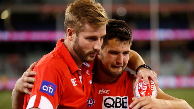 A tearful Nic Newman embraces Alex Johnson after the game. Picture: AFL Media