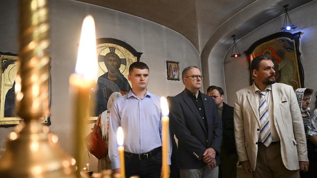 Albanese pauses ahead of lighting a candle at St. Andrews Orthodox Church in Bucha on the outskirts of Kyiv. Picture: AAP