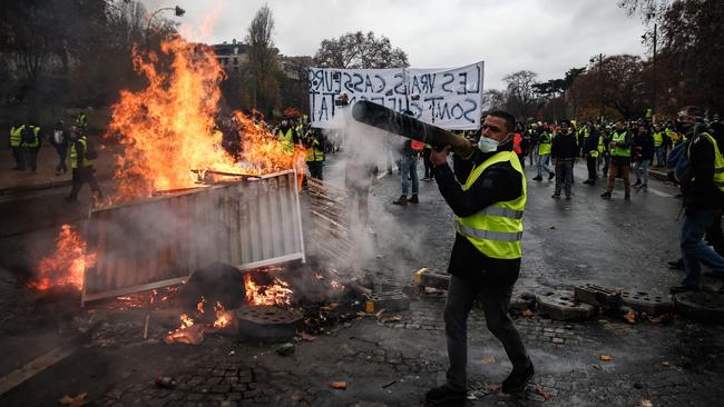 Protesters build a barricade during the protest. Picture: AFP