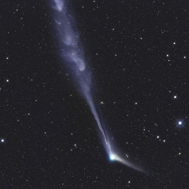 Comet Catalina ... Comet Catalina hurtles through the night sky, leaving a dust trail in its wake, which has undergone several disconnection events during its journey. A second tail of ionised gas emanates from its luminous blue coma, fading into the darkness from which the stars are gleaming out from. Picture: Gerald Rhemann, Insight Astronomy Photographer of the Year 2016 Planets, Comets and Asteroids Runner-up