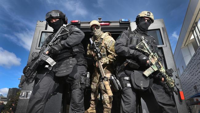 The Queensland Police Service (QPS) and Australian Defence Force (ADF) hold a capability demonstration for the Gold Coast 2018 Commonwealth Games at Broadwater Parklands. SERT squad members at the ready. Picture Glenn Hampson