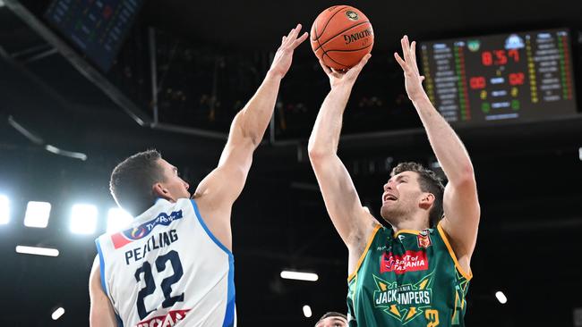 Peatling (left) will provide a solid interior defensive presence for the Hawks. Picture: Getty