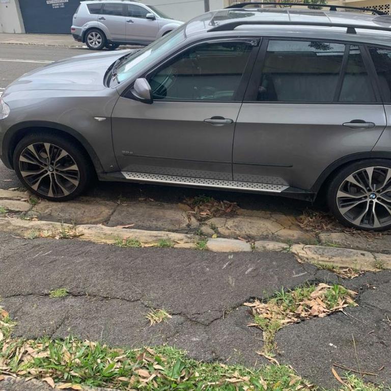 The jeep had broken down outside someone's driveway.