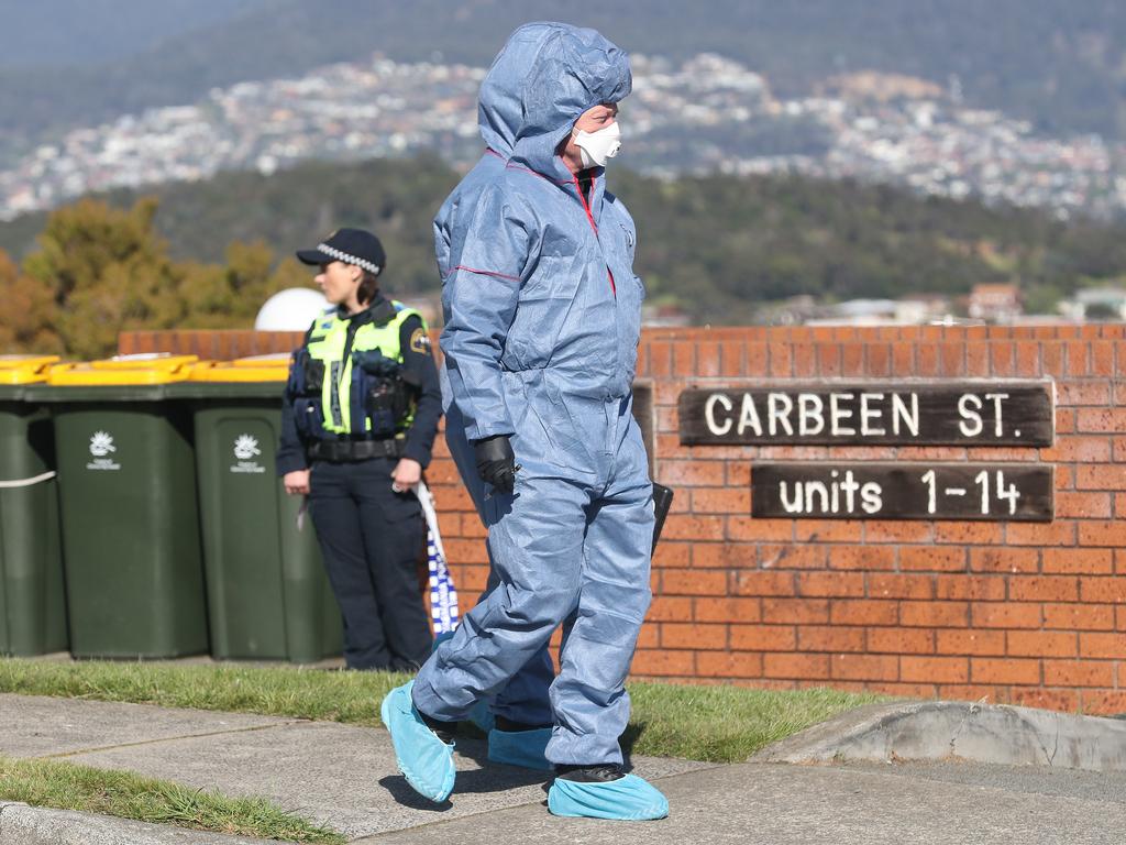 Police at Carbeen Street after Mr Jones’ body was discovered in the car park. Picture: NIKKI DAVIS-JONES