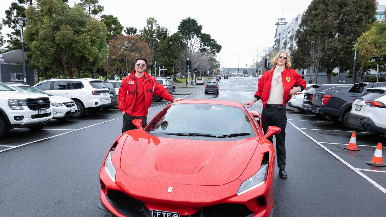 Ollie Henry and Sam De Koning with a Ferrari. Picture: Brad Fleet