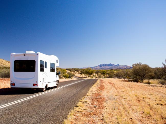 The dream of the big lap: a campervan travelling on near Mt Zeil in Northern Territory. Picture: iStock