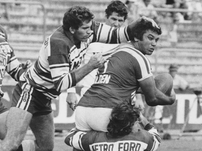 Redcliffe’s Artie Beetson is tackled in a match against Brothers in 1981.